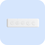 TUSHY Aura remote on a light blue background