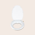 TUSHY Wave bidet seat  on a beige background