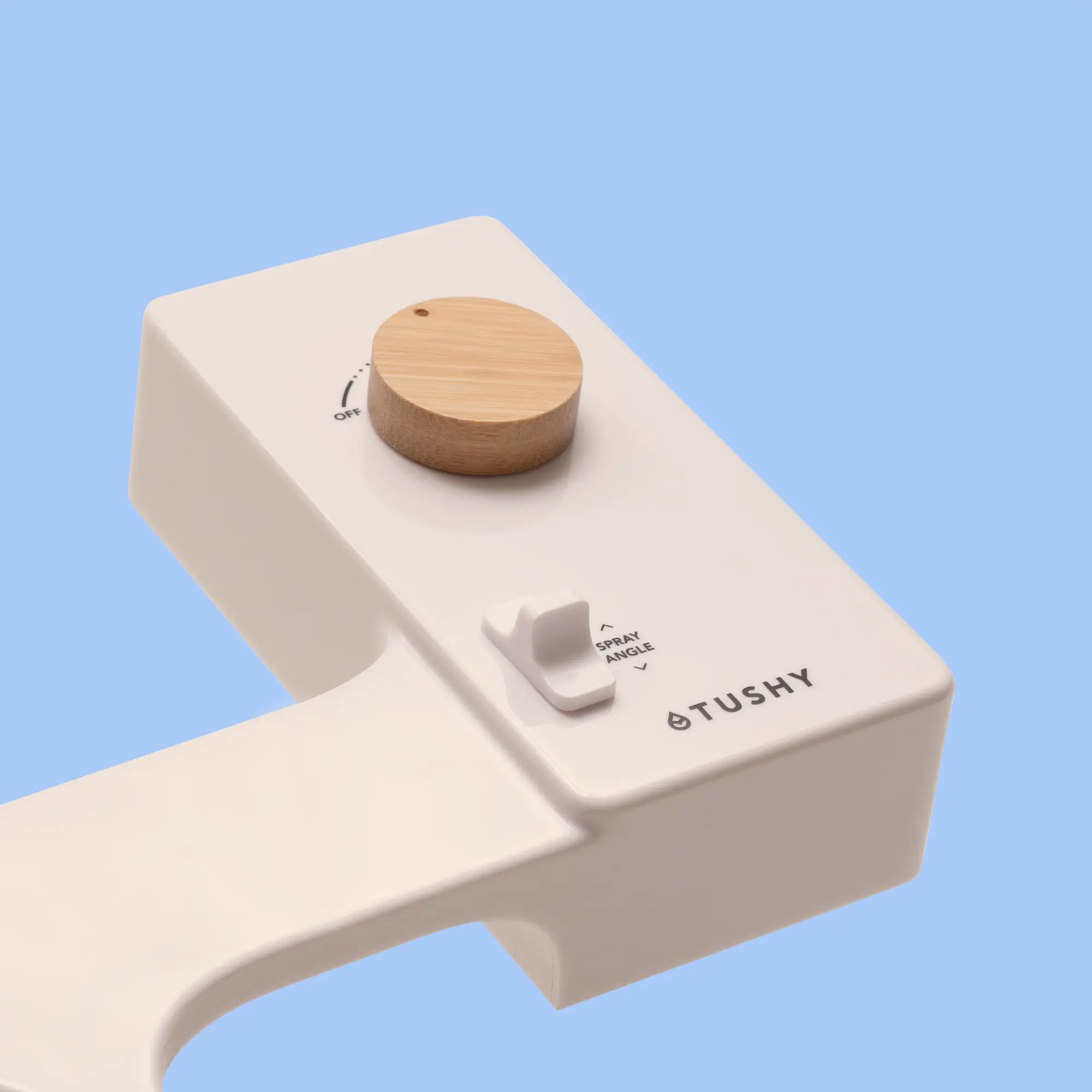 Biscuit 'TUSHY' Classic console, with a bamboo pressure control knob, on a light blue background