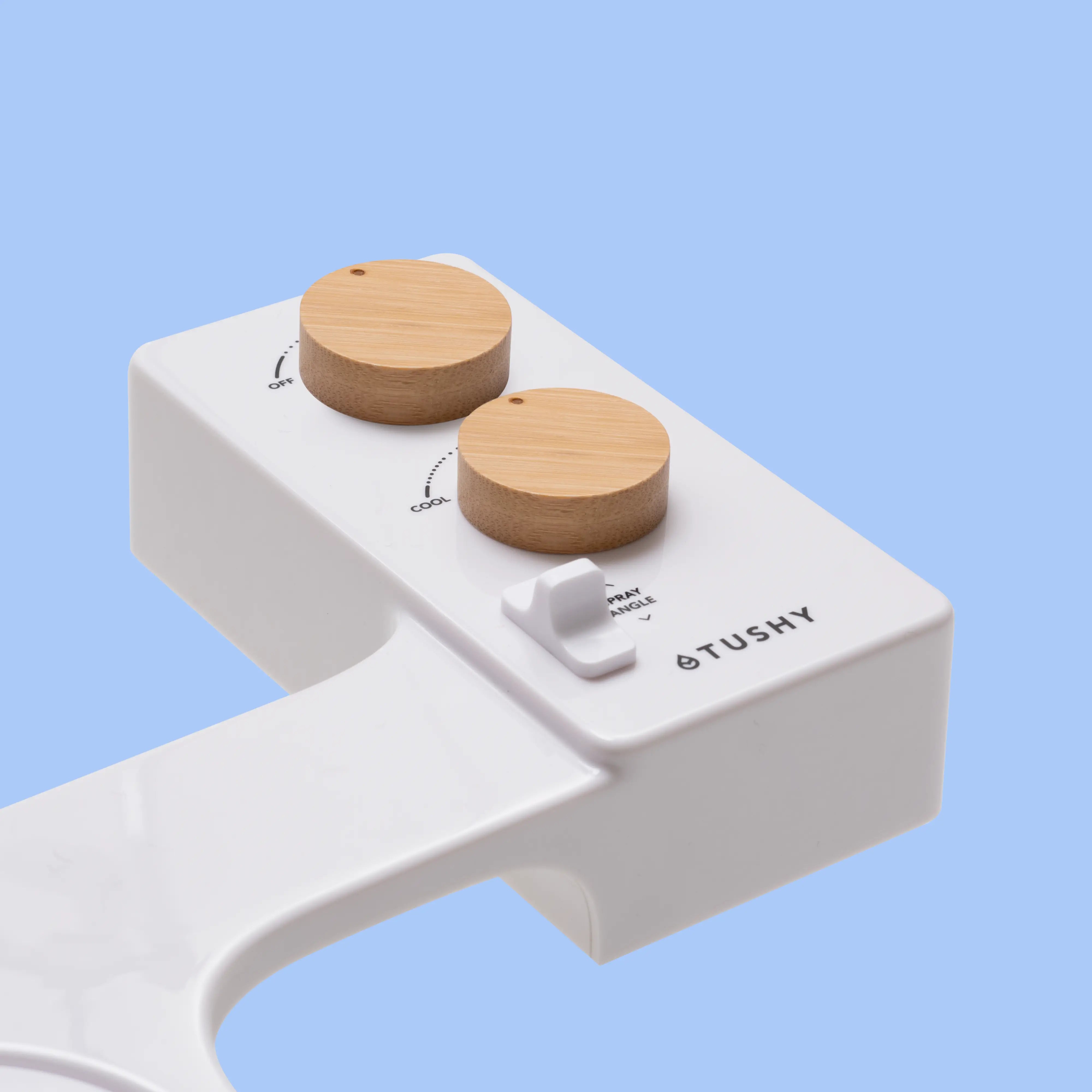 Biscuit TUSHY Spa console with 2 bamboo knobs, on a blue background