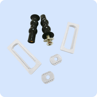 Includes two black mounting pegs, a screw, and three white mounting brackets of various shapes.