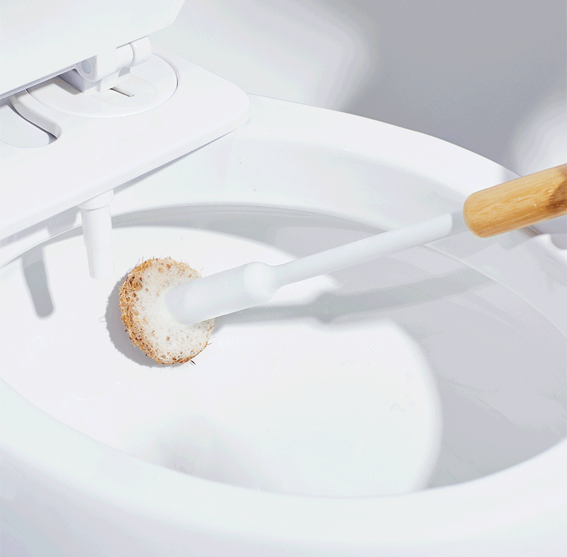 Animation of a Tushy toilet brush scrubbing the inside of a toilet