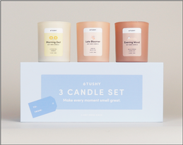 TUSHY 3 Candle Set, with Morning Zest in yellow, Late Bloomer in Peach and Evening Wood in terracotta colored containers