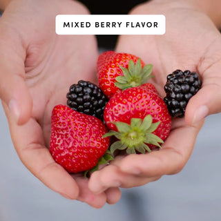 Hands holding a mix of strawberries and blackberries.