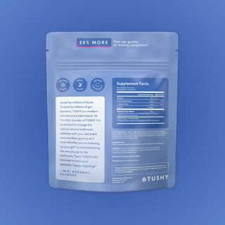 Blue packaging for Reboot Fiber Gummies with supplement facts and branding details from TUSHY.