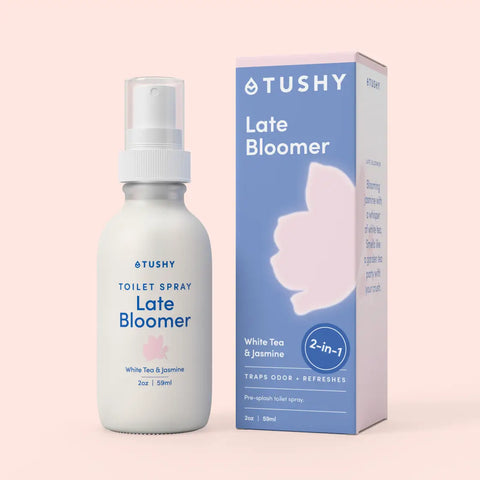Tushy Late Bloomer toilet spray bottle and packaging on a light pink background