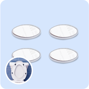 Four oval toilet seat bumpers with adhesive backing for installation.