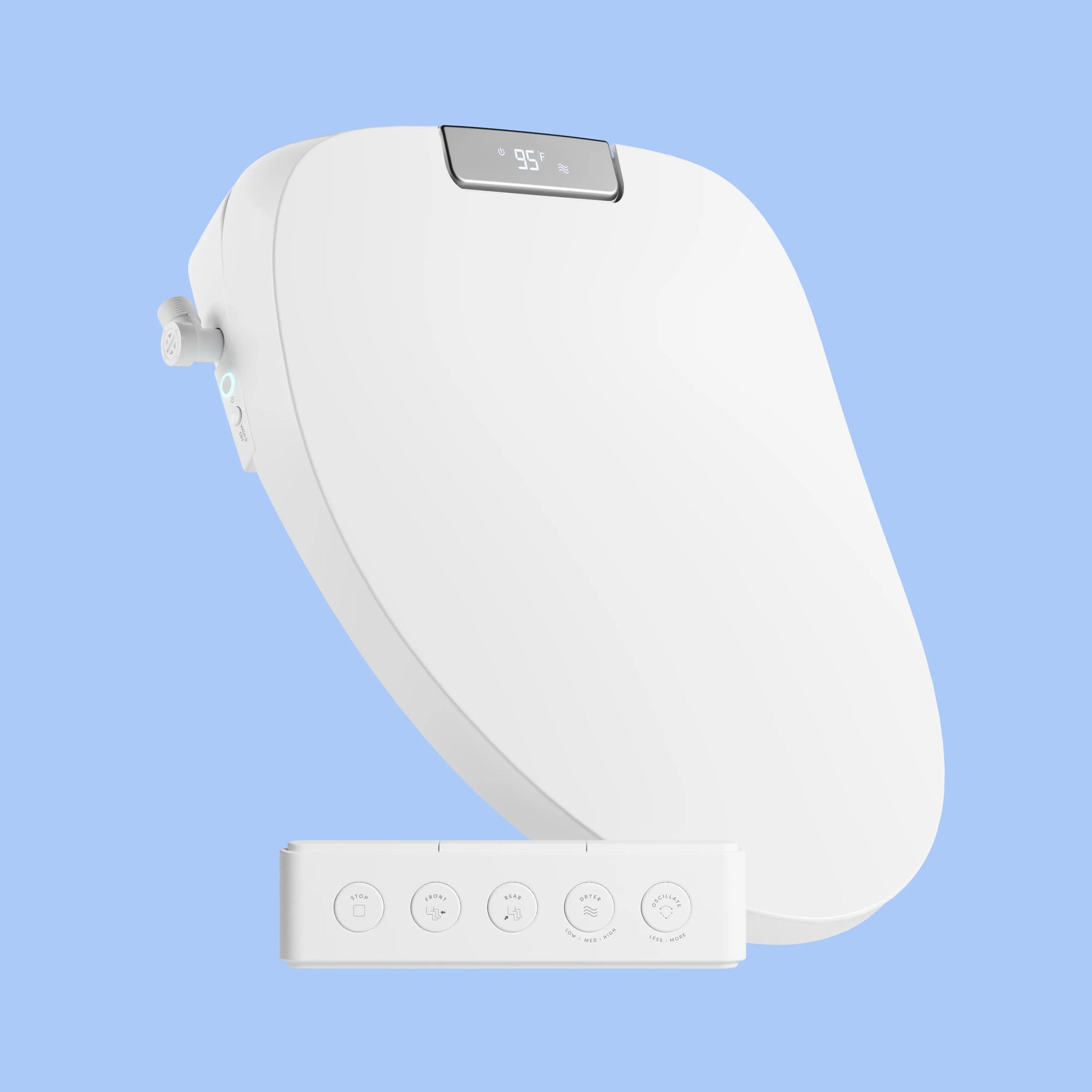 White TUSHY Aura bidet seat, lid closed, with remote control, on a blue background