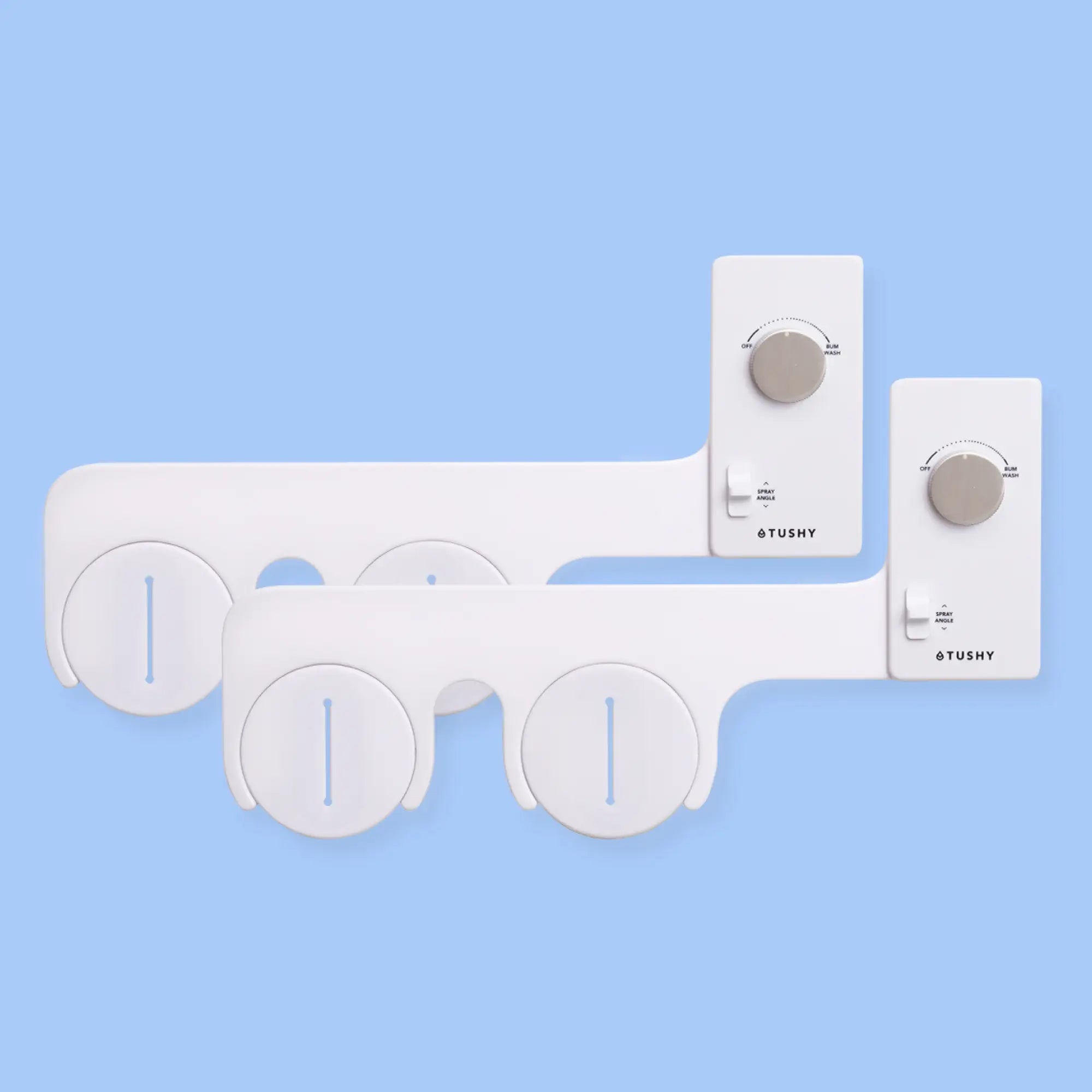 2 pack of TUSHY Classics in white, with platinum pressure control knobs, on a light blue background
