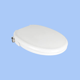 3/4 view closed lid, TUSHY Oasis with a platinum control knob, on a blue background.