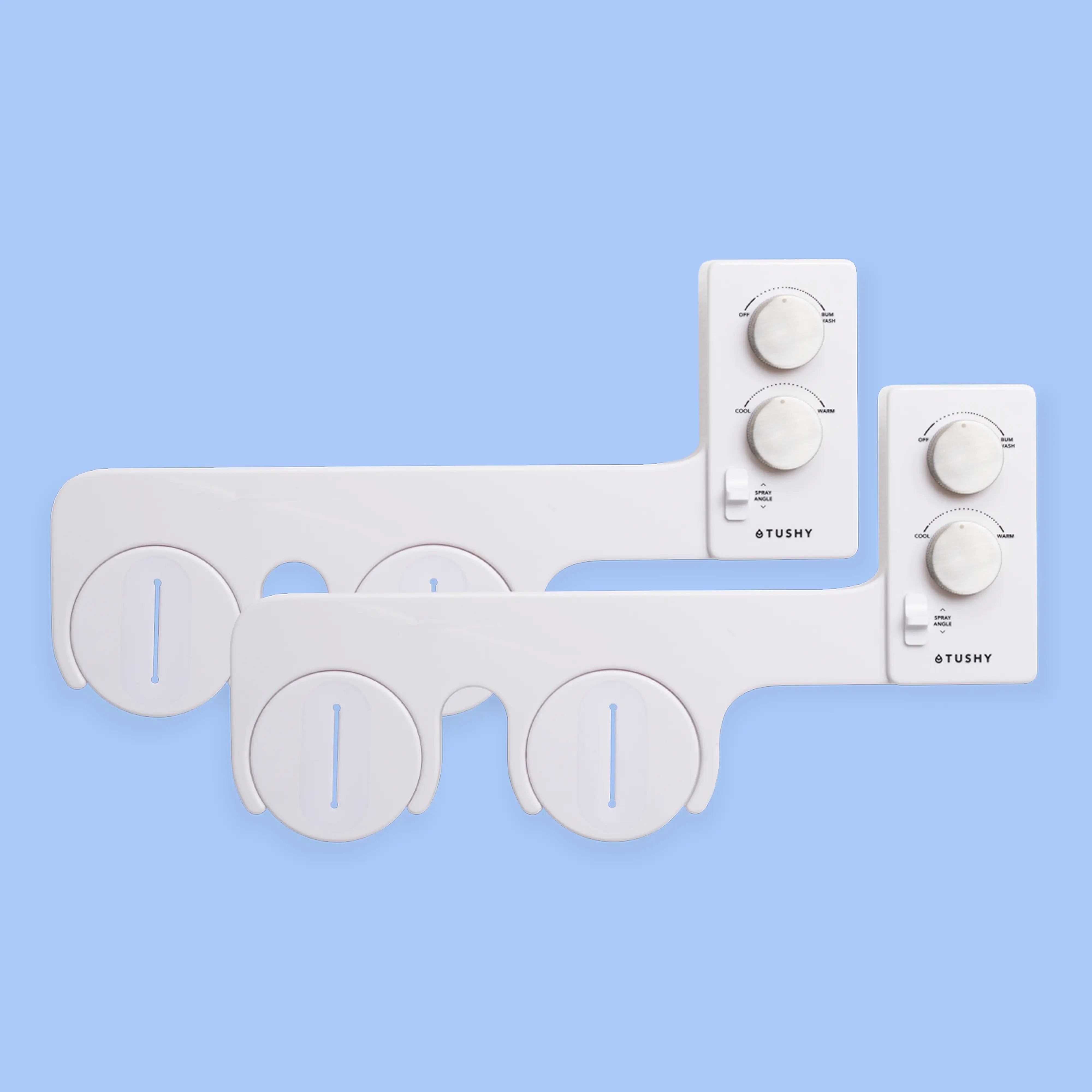 2 White TUSHY Spa bidet attachments, with 2 platinum knobs, on a blue background