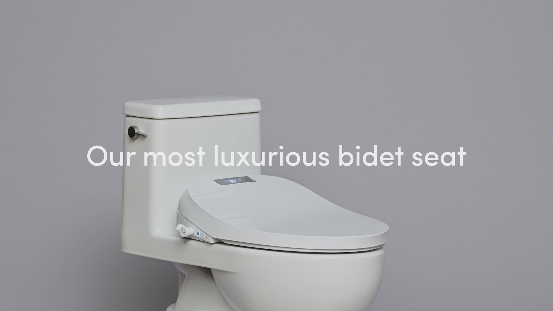 Short video about the Aura, how it works -- reads: Our most luxurious bidet seat.  Meet Aura by TUSHY. Instant warm water. High definition digital display. Soothing heated seat.  Stainless steel self-cleaning nozzle. Integrated night light. Adjustable oscillation.