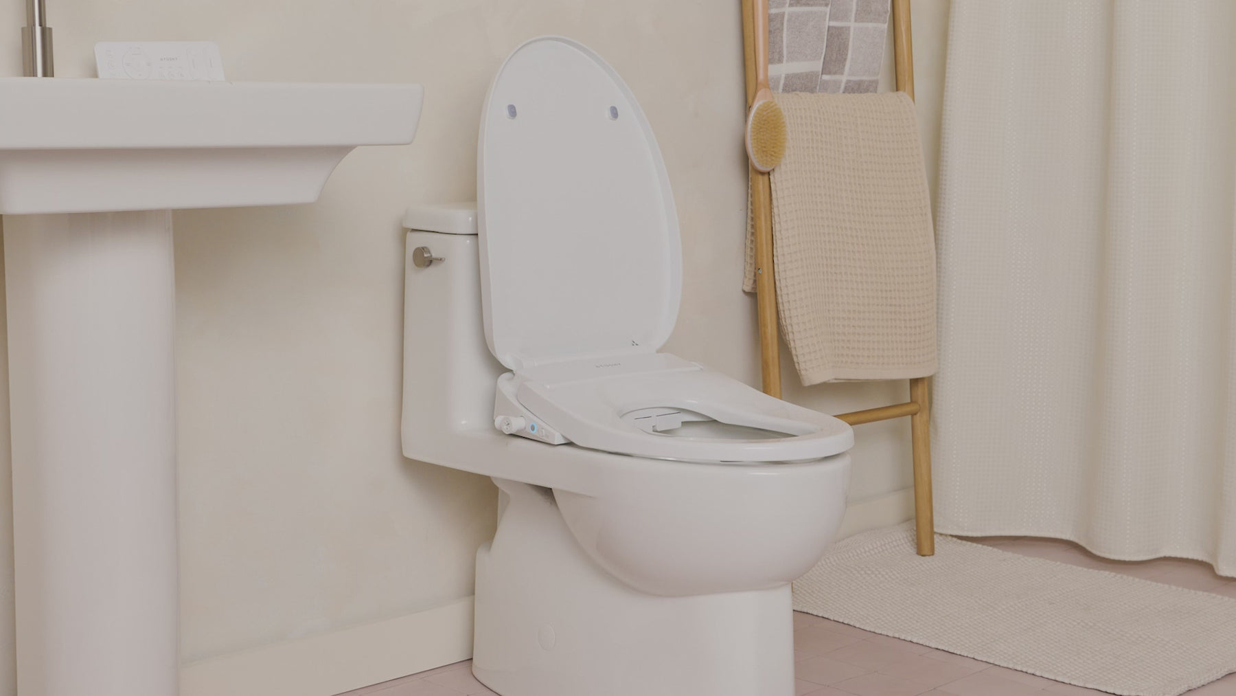 Cloud+ how it works video displaying the different parts of the bidet -  Cloud+ by TUSHY.  Instant Warm Water. Intelligent remote. Soothing heated seat.  Integrated night light. Adjustable oscillation. Auto-deodorizer. Cloud nine unlocked