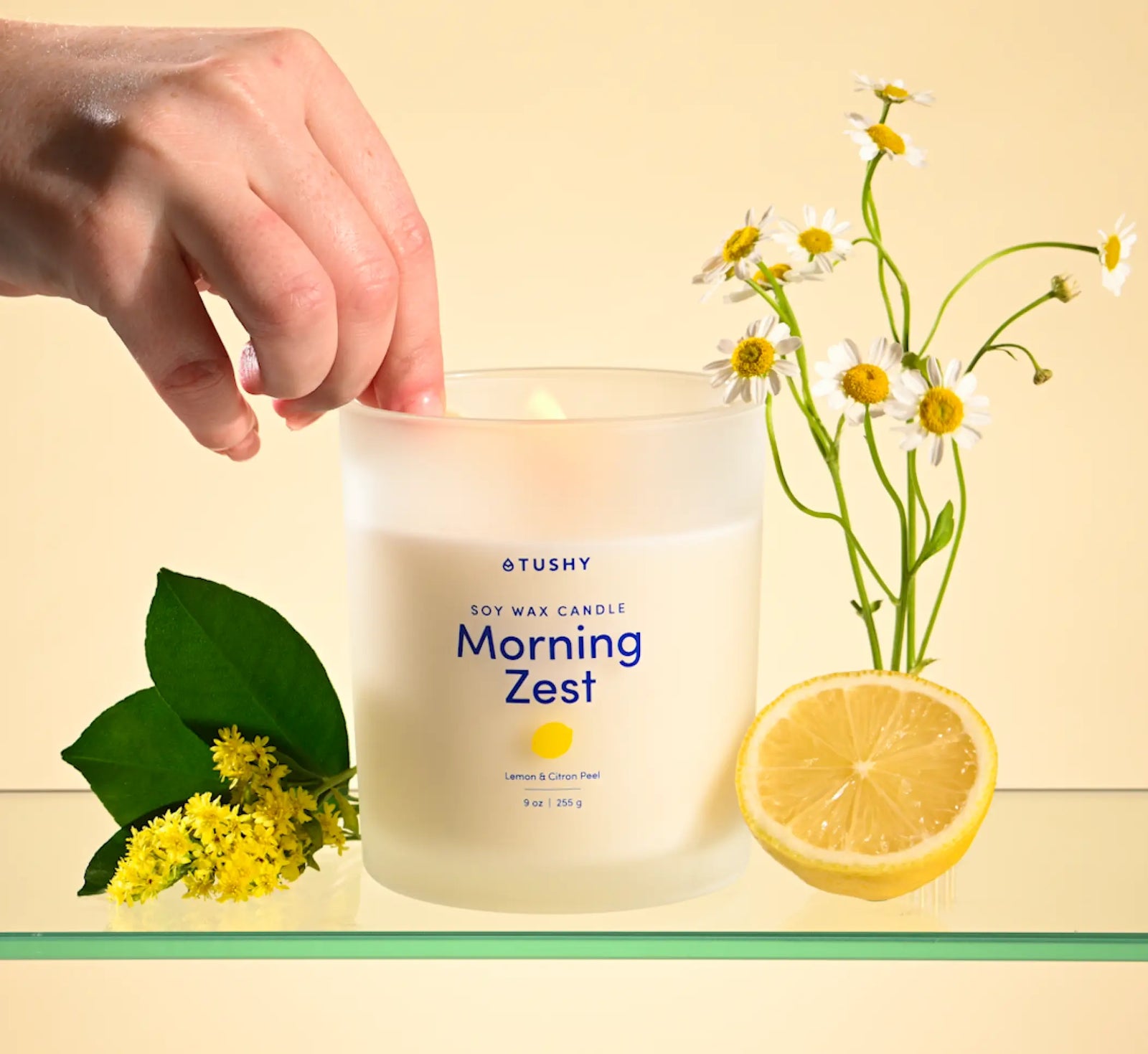 Morning Zest candle being lit