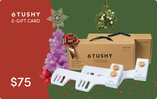E-gift card for TUSHY products, featuring a $75 value, with a festive background and product packaging.